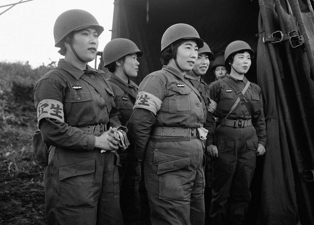 Women nurses of Japan's newly-formed Self-Defense Corps man an aid station on Hokkaido, Japan, during maneuvers on October 20, 1955.