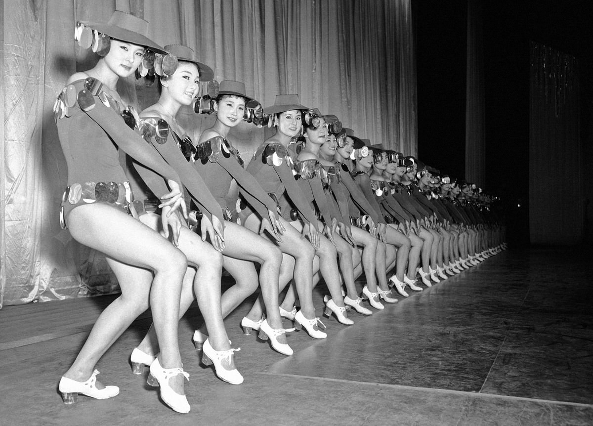 Japanese dancers of the Schochiku dancing troupe rehearse one of their new numbers in the "natsu-no-odori" summer dance scene which they performed at the Kokusai Theater in Tokyo on July 11, 1958.