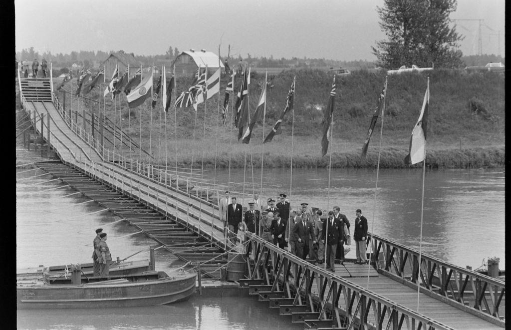 Group of people walking on a dock during the British Empire and Commonwealth Games, Vancouver, 1954.