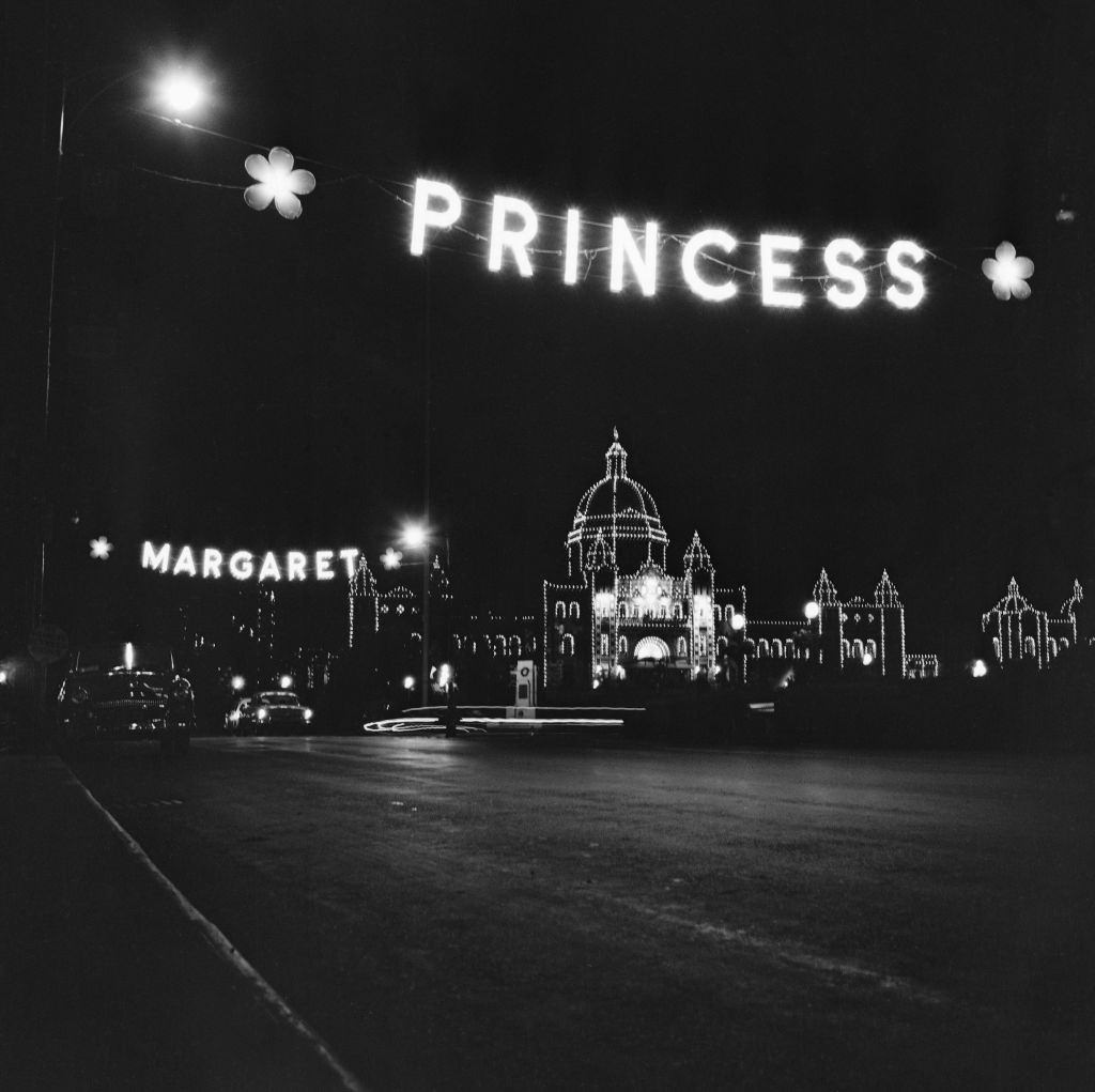 Parliament buildings at night showing Princess Margaret's name in lights, Vancouver, Canada, 18th July 1958.