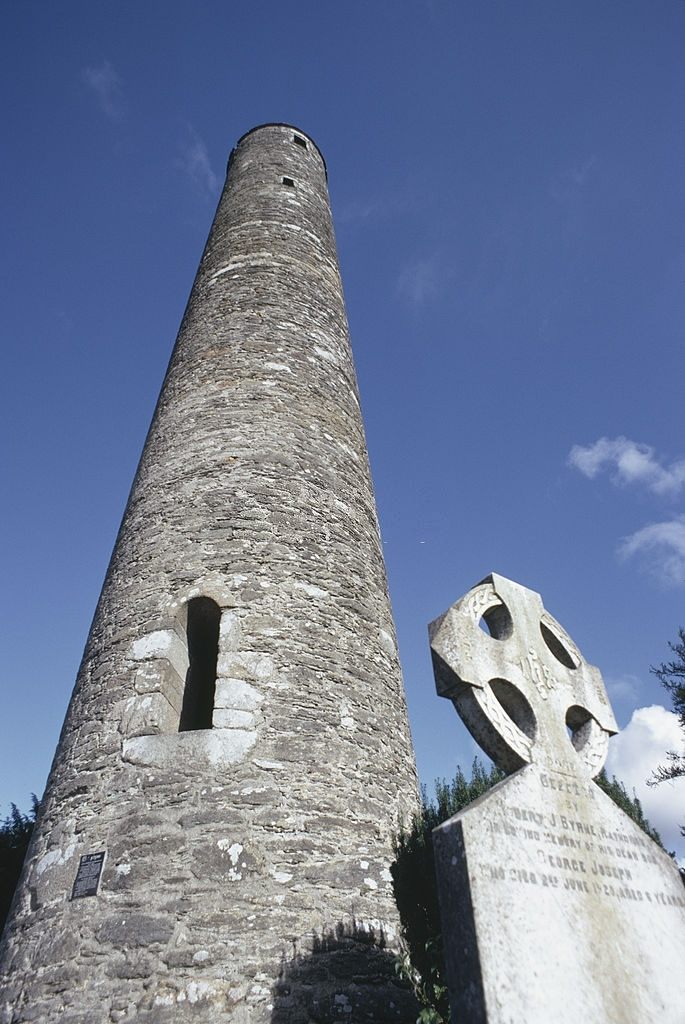 A view of the round tower, a slate built landmark and bell tower at Gelndalough, County Wicklow, Ireland, August 1967.