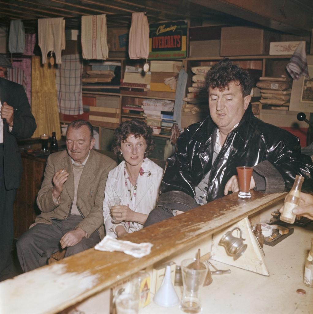 Irish poet and writer Brendan Behan at a bar general store in County Donegal, Ireland in 1960.