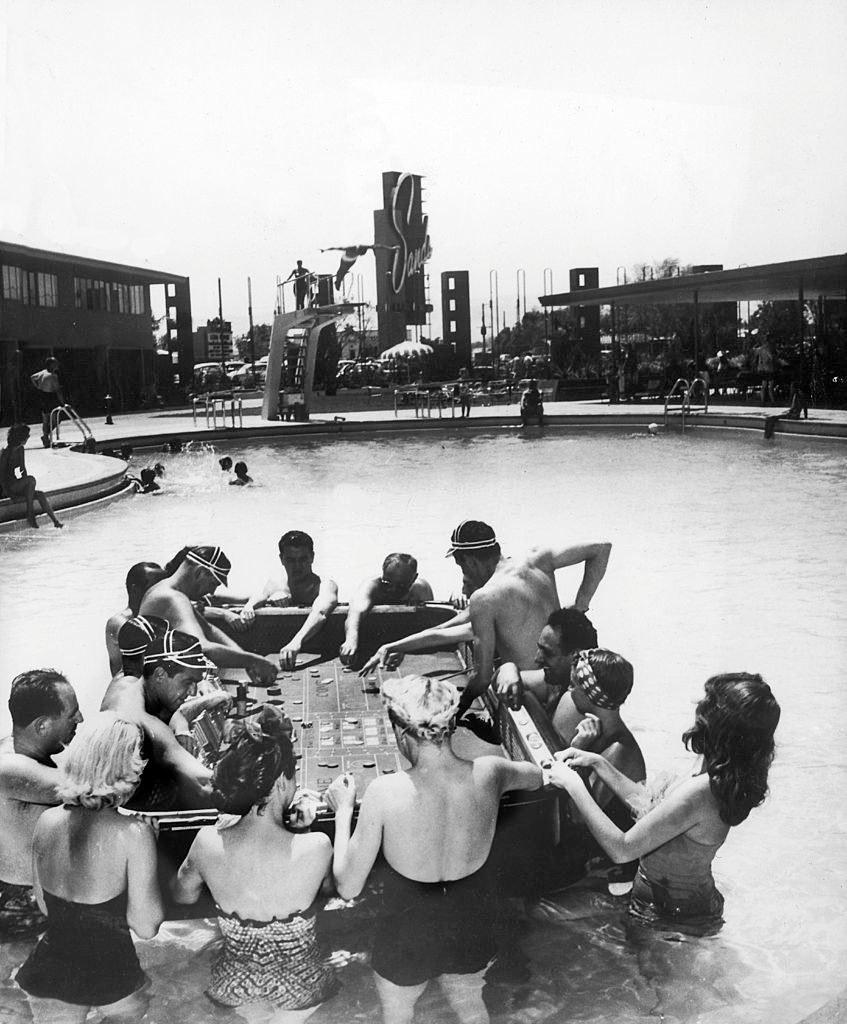 Craps players in a pool, Las Vegas, 1960s.
