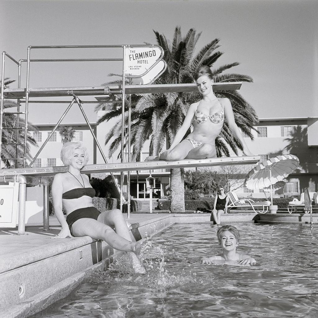 People gambling at Caesar's Palace casino, 1966.