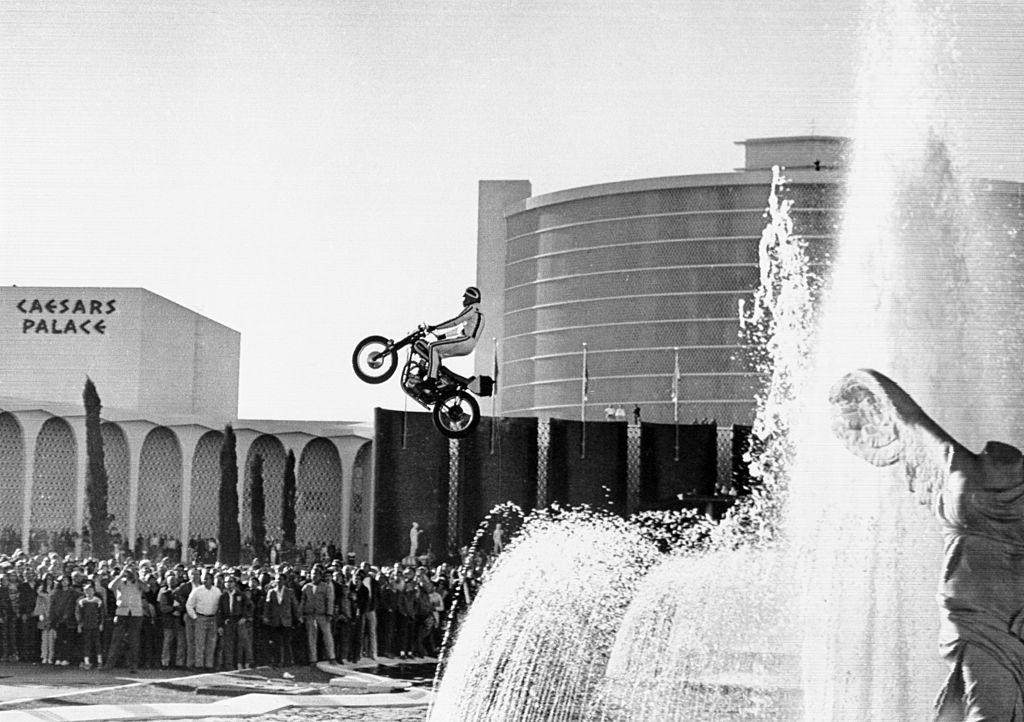 Motorcycle stunt man Evel Knievel jumping over the fountain at Caesars Palace in Las Vegas, 1967.
