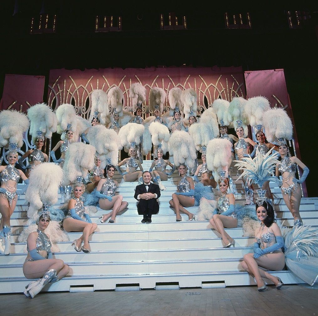 Gene Kelly with he Folies Bergere Showgirls in Las Vegas, 1969.