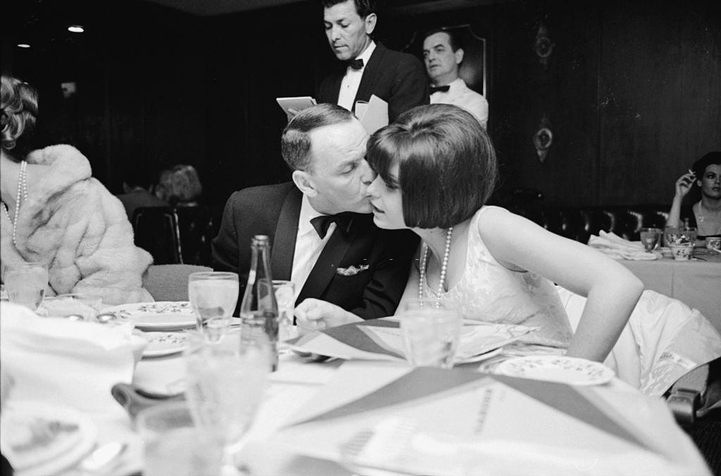 Frank Sinatra kissing her daughter Tina, Las Vegas, 1965.