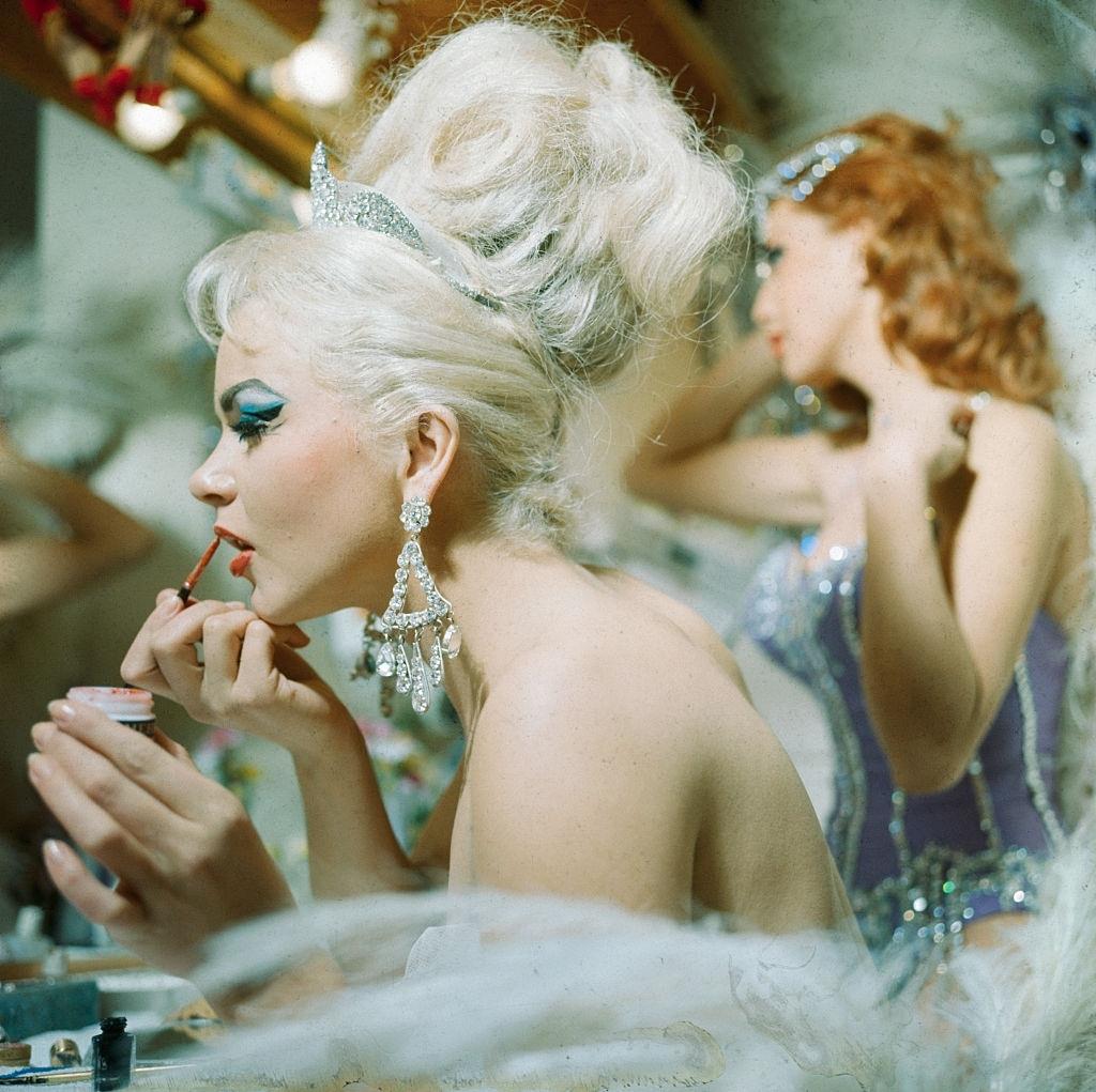 Tropicana dancers dress for a show celebrating the centennial of the original Folies Bergere, at Hotel Tropicana, Las Vegas, 1969.