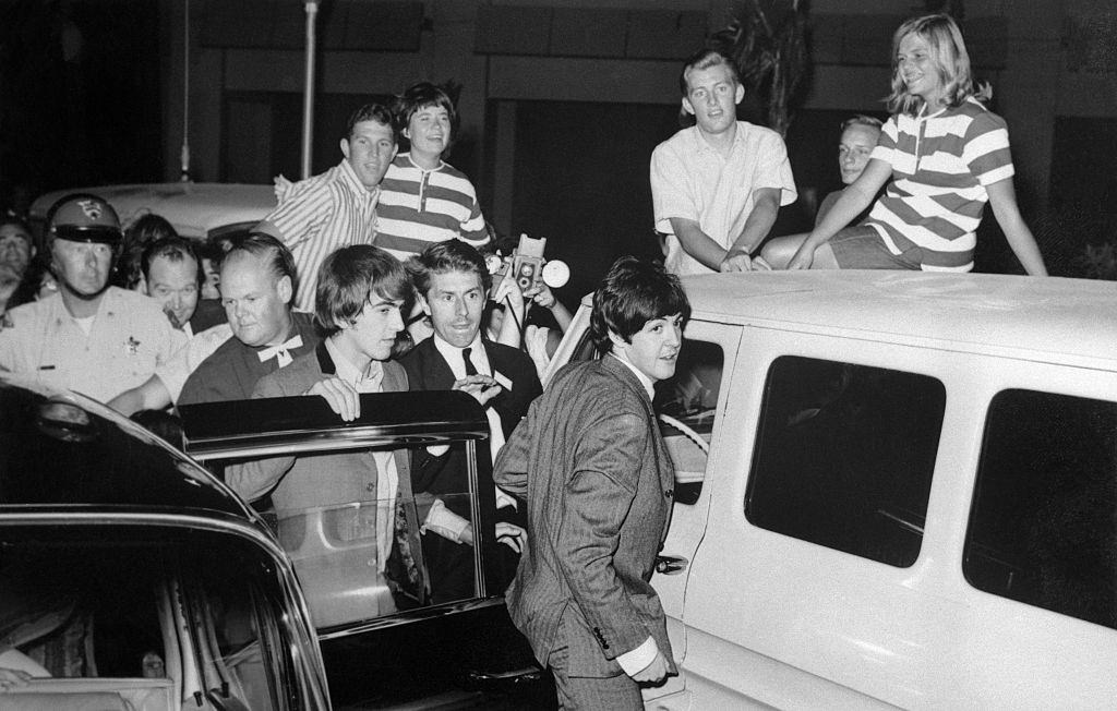Beatles arriving at the Hotel Sahara through a freight entrance, Las Vegas, 1964.