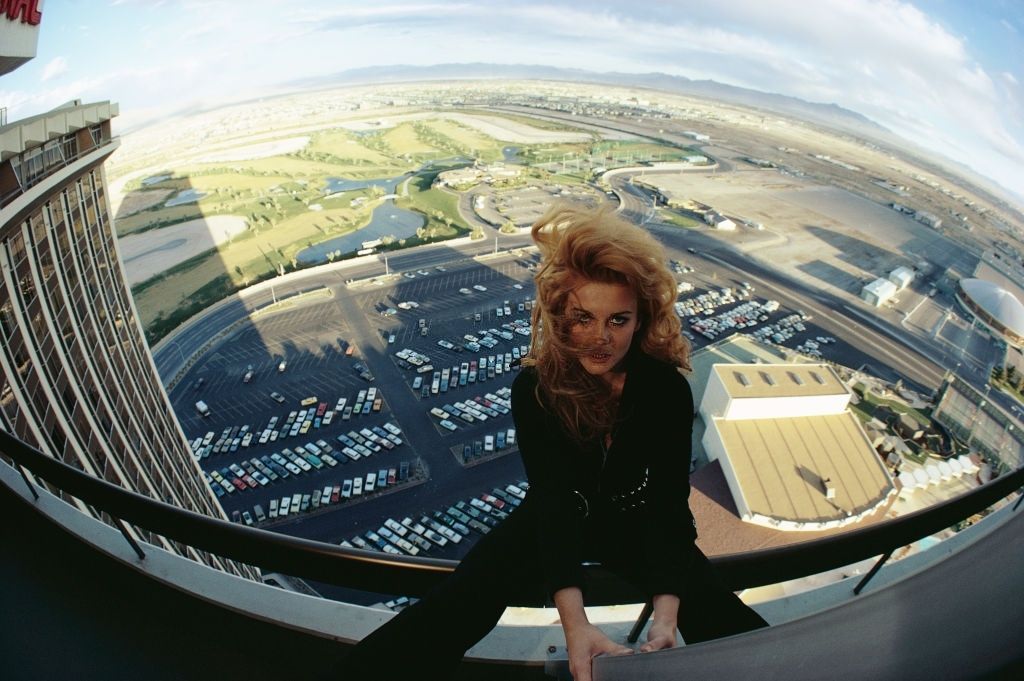 Ann-Margret sits on the railing of a hotel balcony in Las Vegas, 1969.