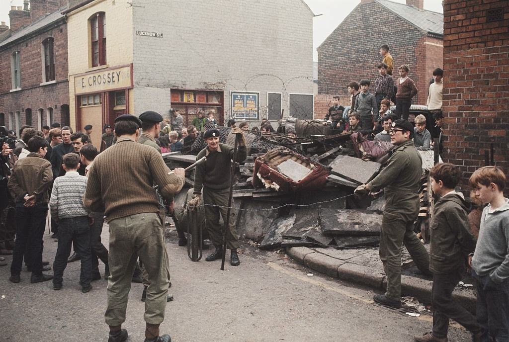 British troops erecting barricades on the corner of Lucknow street, Belfast, Northern Ireland, September 1969.