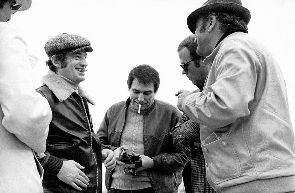 Jean-Paul Belmondo and Robert Hossein on the set of the film 'Le casse' directed by Henri Verneuil in 1971 in Athens, Greece.