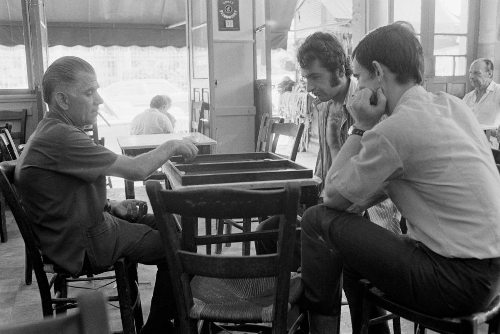 Backgammon players in a bistro in Athens in July 1973, Greece.