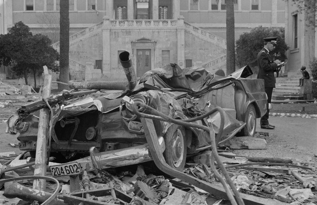Debris of cars and buses after an attack in front of the Polytechnic school in Athens during martial law on November 20, 1973, Greece.