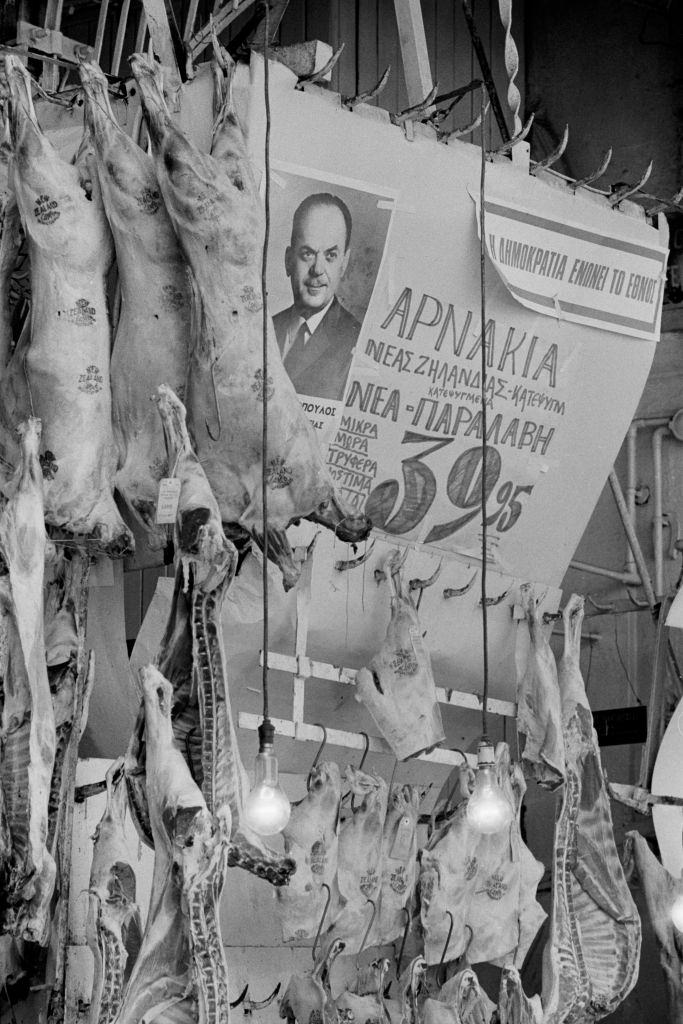 Portrait of a Greek politician on the stall of a butcher's shop in Athens on July 29, 1973, Greece.