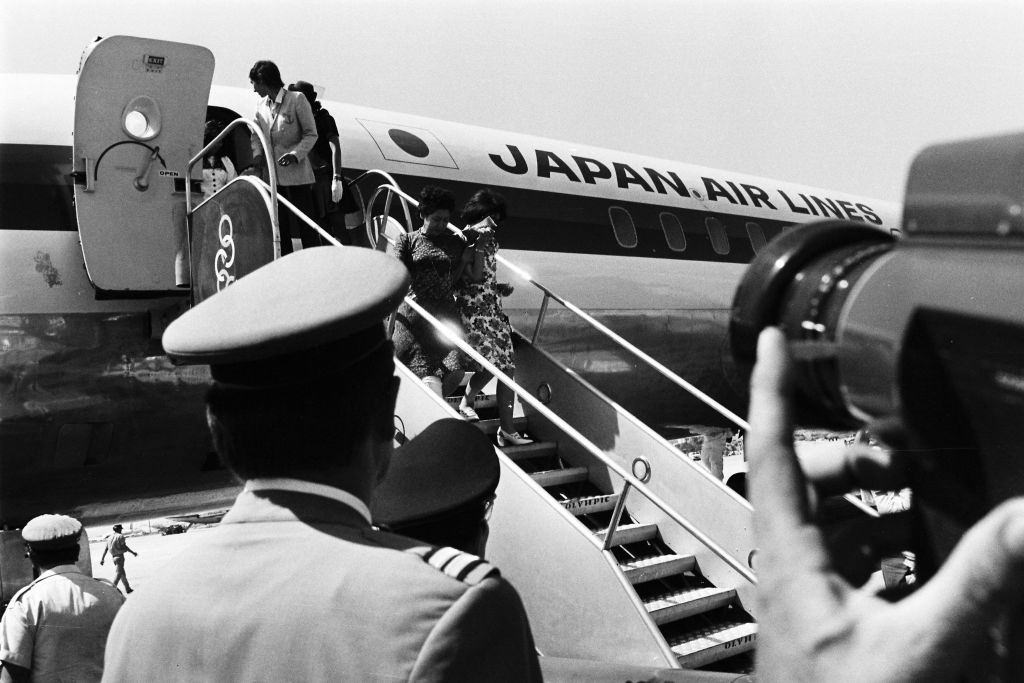 Released passengers of the hijacked Japan Airlines flight 404 get off an airplane on arrival at Athens International Airport on July 26, 1973