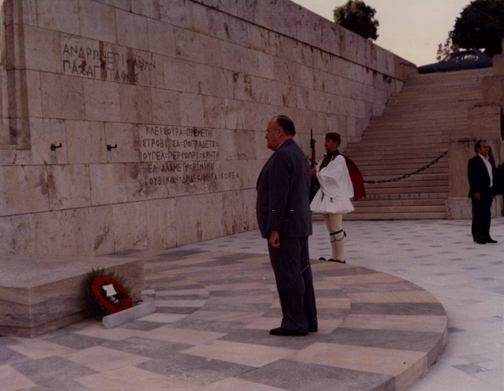 Prime Minister Robert Muldoon of New Zealand laying a reef at a war memorial in Athens, 1978.