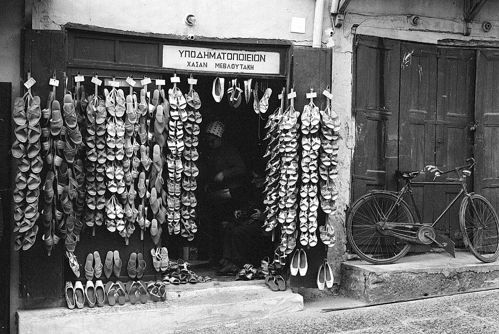 A shoe shop in a Greek island. Greece, 1970s