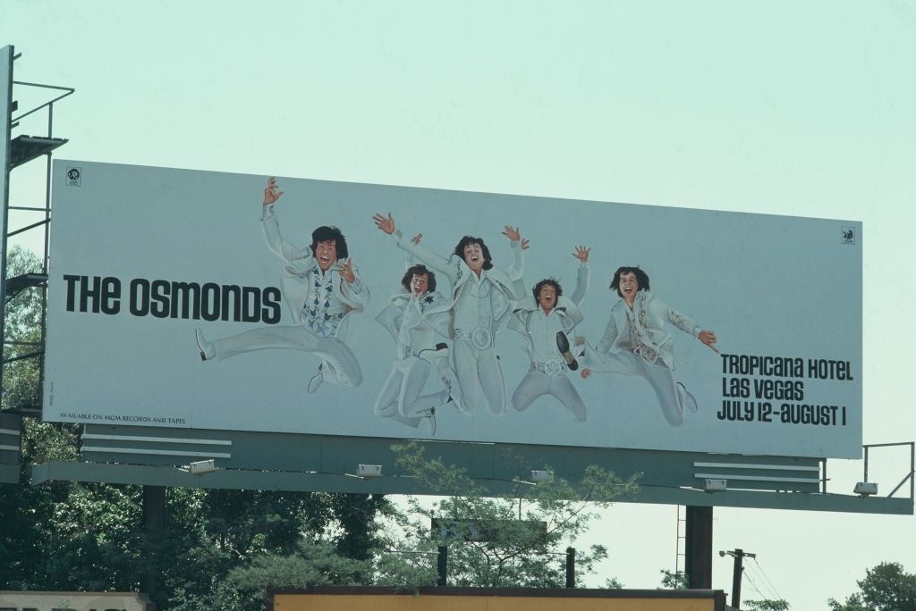 A hoarding advertising an appearance by The Osmonds at the Tropicana Hotel in Las Vegas from July to August 1974.