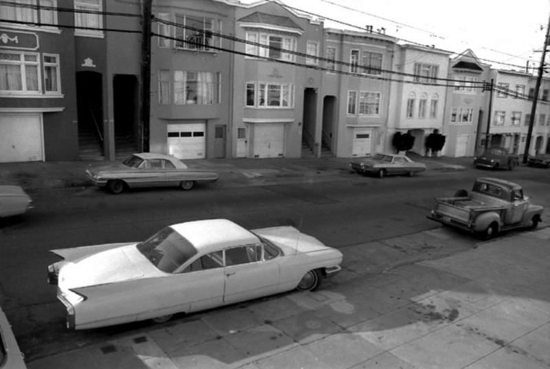 A 1960 Cadillac Coupe Deville on 8th Avenue, Richmond district, San Francisco, 1974