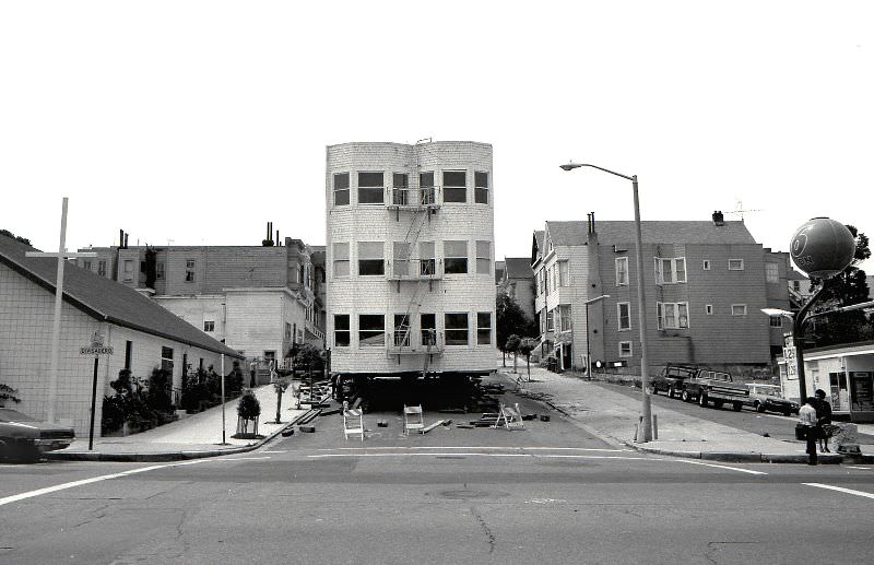Apartment building being moved to it's new location, Ellis and Divisadero, Western Addition, San Francisco, 1977