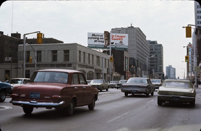 University Theatre in the background of a street scene.