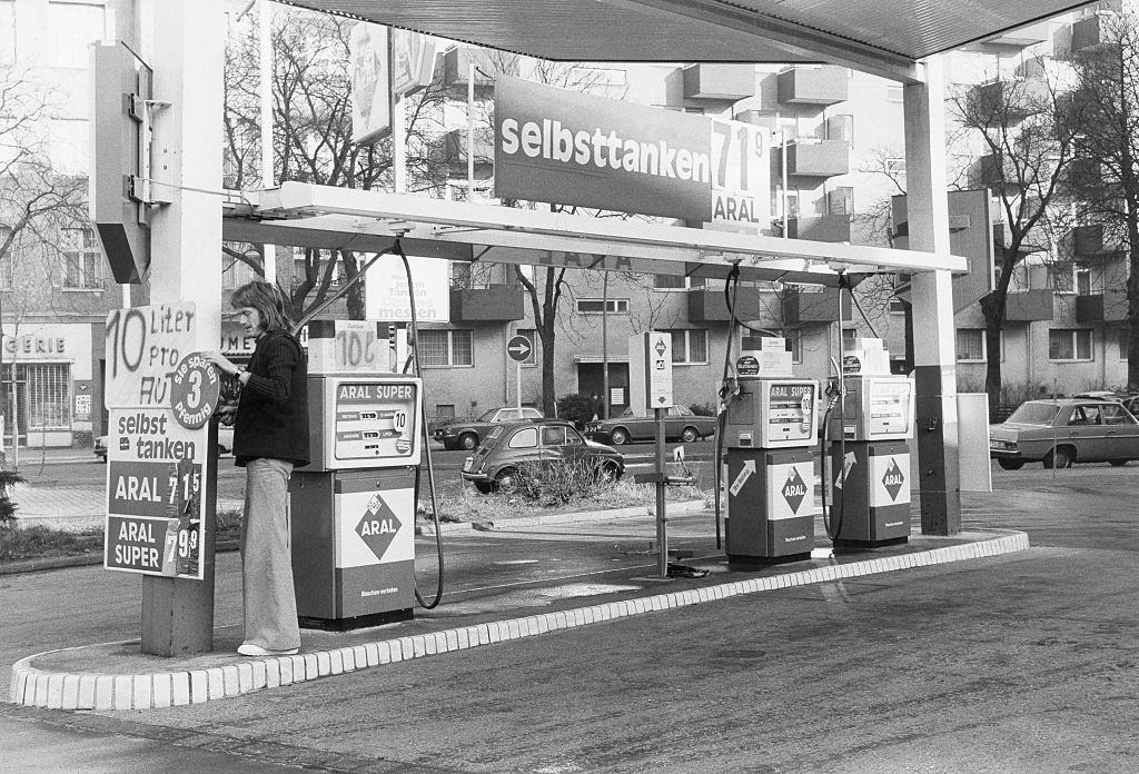 Petrol station with information that only 10 liters are sold per customer due to the oil crisis, Germany - November 1973