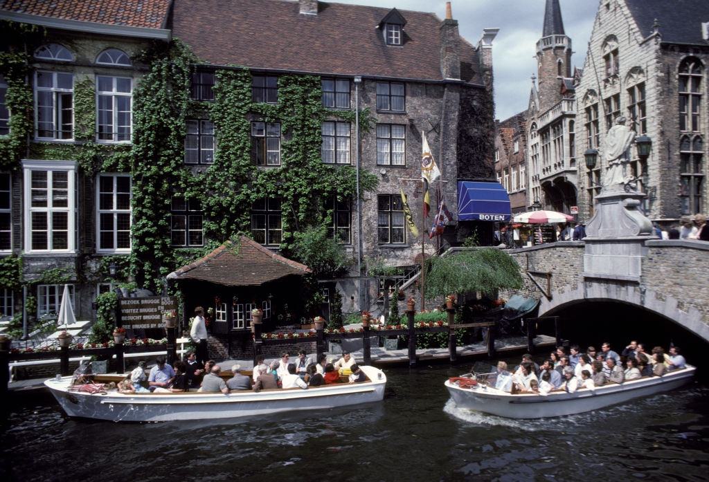 Tourist boats on the Zwin river, Bruges, August, 1985.