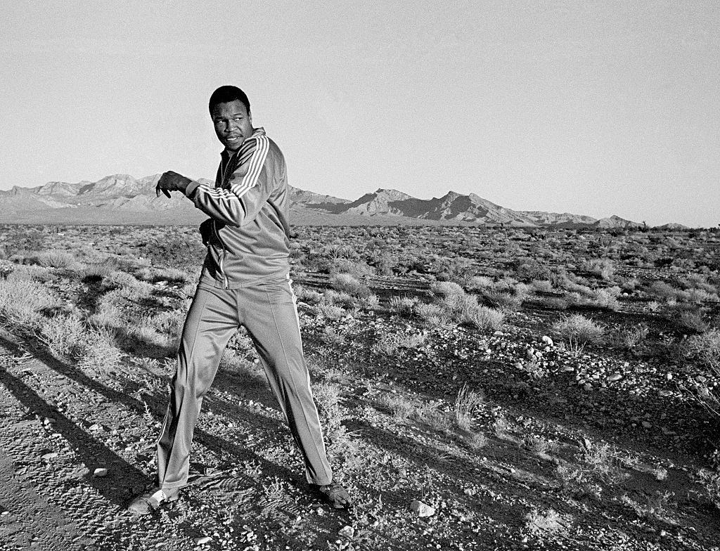 Larry Holmes warming up before an early morning run in the desert outside Las Vegas, circa September 1980.