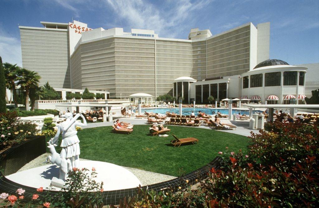 Sunbathing lawn and pool on the outside of the Caesars Palace hotel casino in the Las Vegas, 1981.