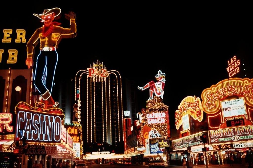 Night scene with neon sign of the casinos on the "Strip", the main thoroughfare in Las Vegas, June 1981.