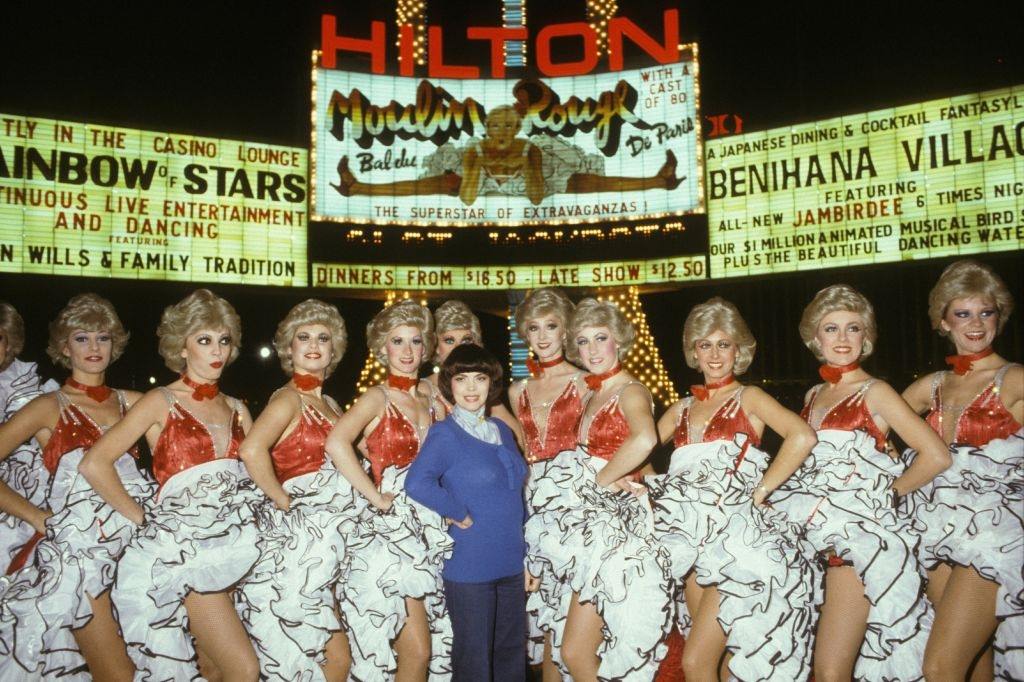 Mireille Mathieu with Jacki Clerico and his wife and the Moulin Rouge troupe in Las Vegas, 1982.