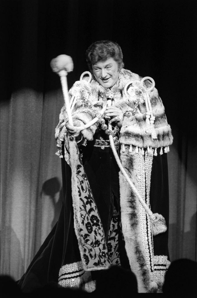 American musician and entertainer Liberace performs onstage, Las Vegas, 1980s.