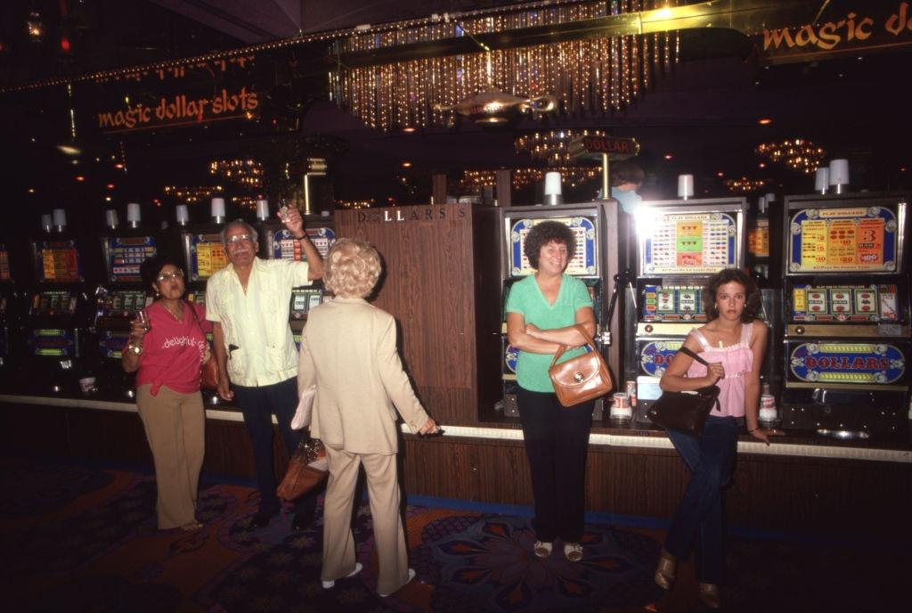 Players in the slot machine room of a Las Vegas casino in 1980.