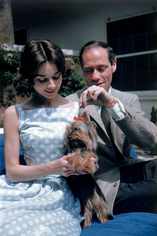 Audrey Hepburn with her husband Mel Ferrer at the Bel Air Hotel in Los Angeles, 1957.