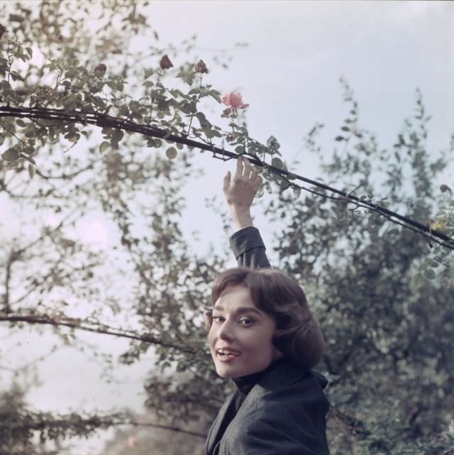 Audrey Hepburn on location for 'Love in the Afternoon' near the Chateau de Vitry in Gambais, France, 1957.