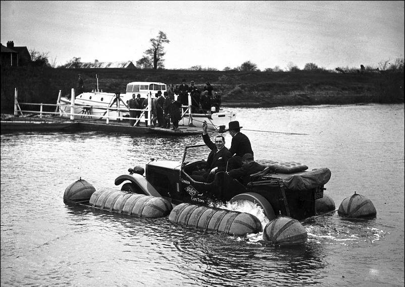 Captain Malin with an amphibian Riley car going down the Severn.