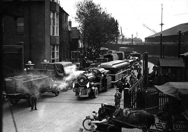 A trackless train leaving King George V Dock for London