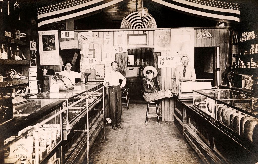 General Store including shopkeepers, a customer and a cowboy, Denver, 1910.
