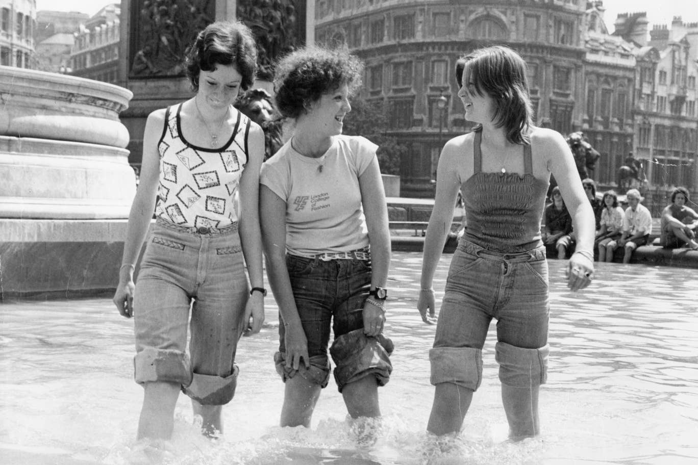 Cooling off in the fountains at Trafalgar Square