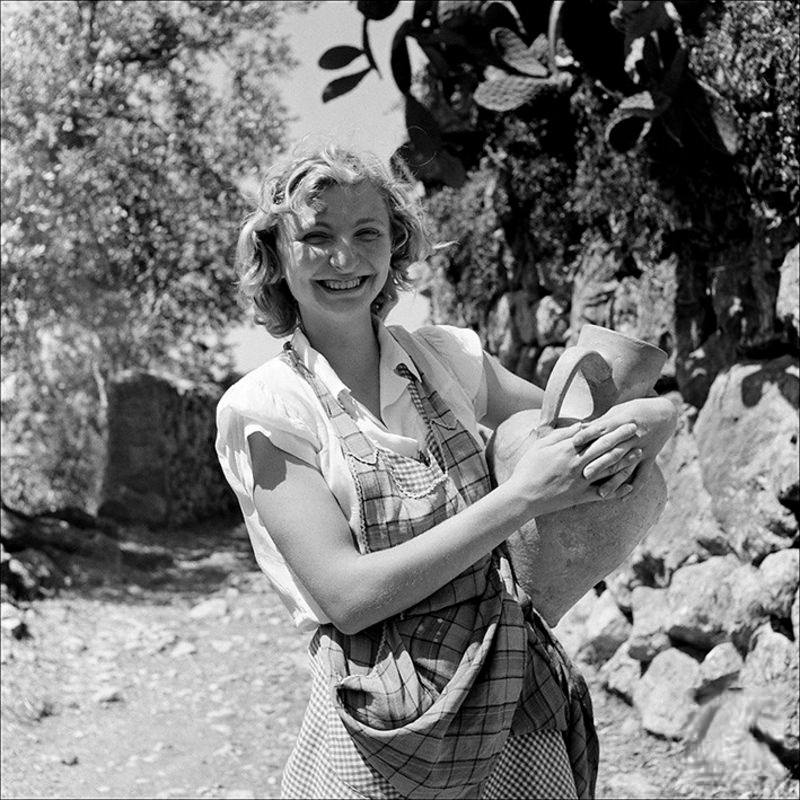 Portrait of a beautiful woman with pitcher, 1956