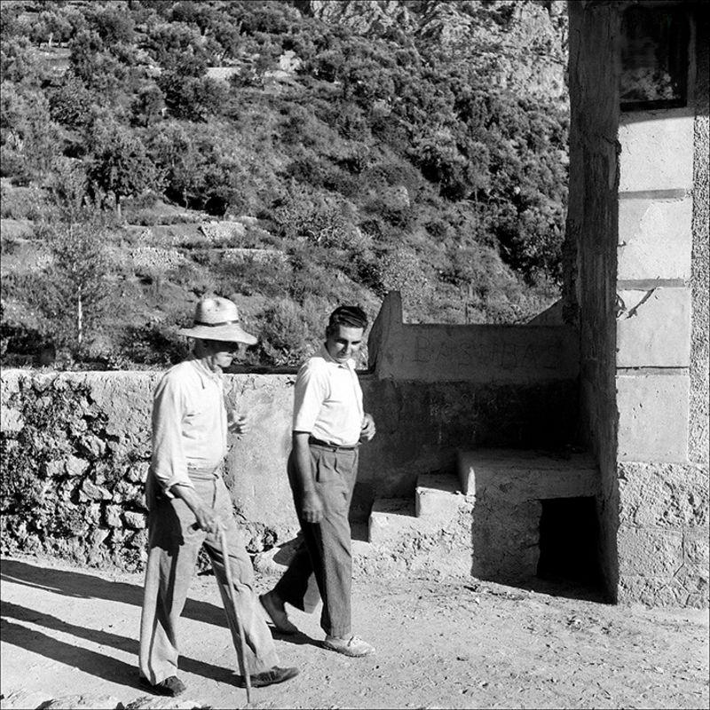 Two men walking, 1956