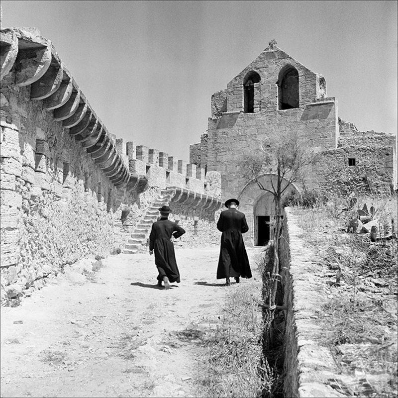 Two priests heading towards the oratory of Capdepera Castle, 1956