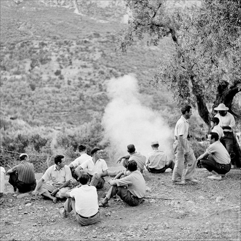 Group of men waiting at the Fornalutx bull's party, 1957