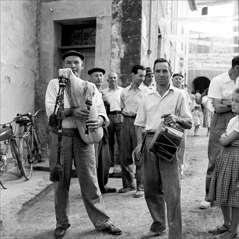 Two men walking down the Plaza Joan Carles I in Palma, 1957