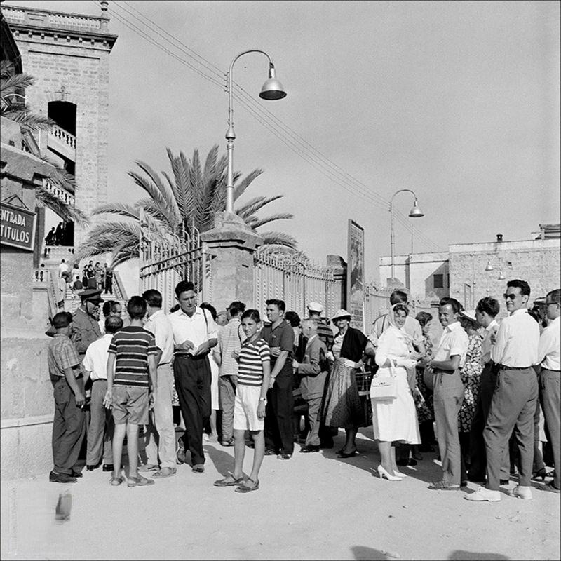 People at the entrance to the bullring in Palma, 1956