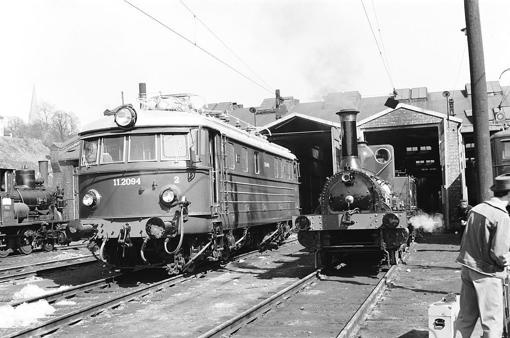 Electric and steam locomotives at Oslo, Norway, 1954.
