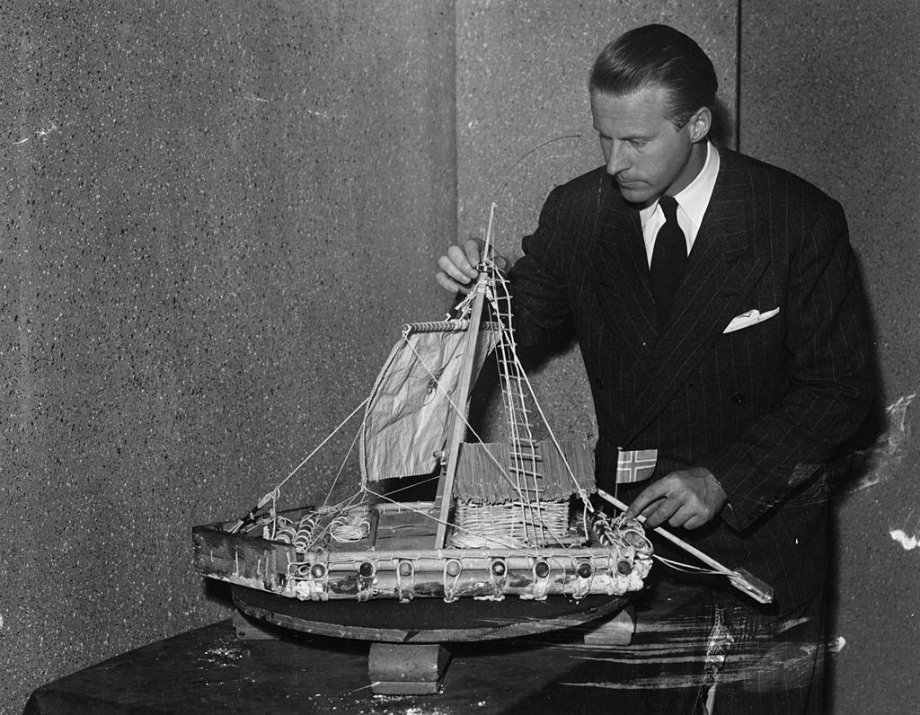 Norwegian anthropologist Thor Heyerdahl with a model of the balsa raft 'Kon Tiki', 1950.