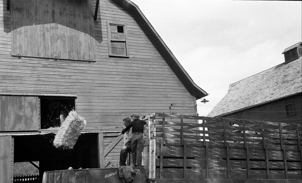 Men standing near a truck during the Nebraska State Fair in Omaha.