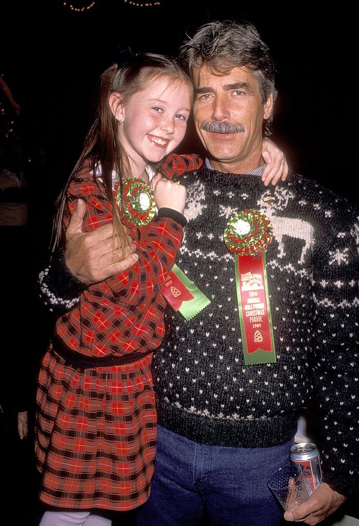 Sam Elliott with Rebecca Harrell at the 56th Annual Hollywood Christmas Parade on November 26, 1987